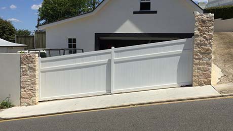Sliding gate on a sloping driveway