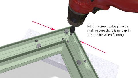 Close up of one corner showing the pattern of the four screws with a cordless drill on the last screw.